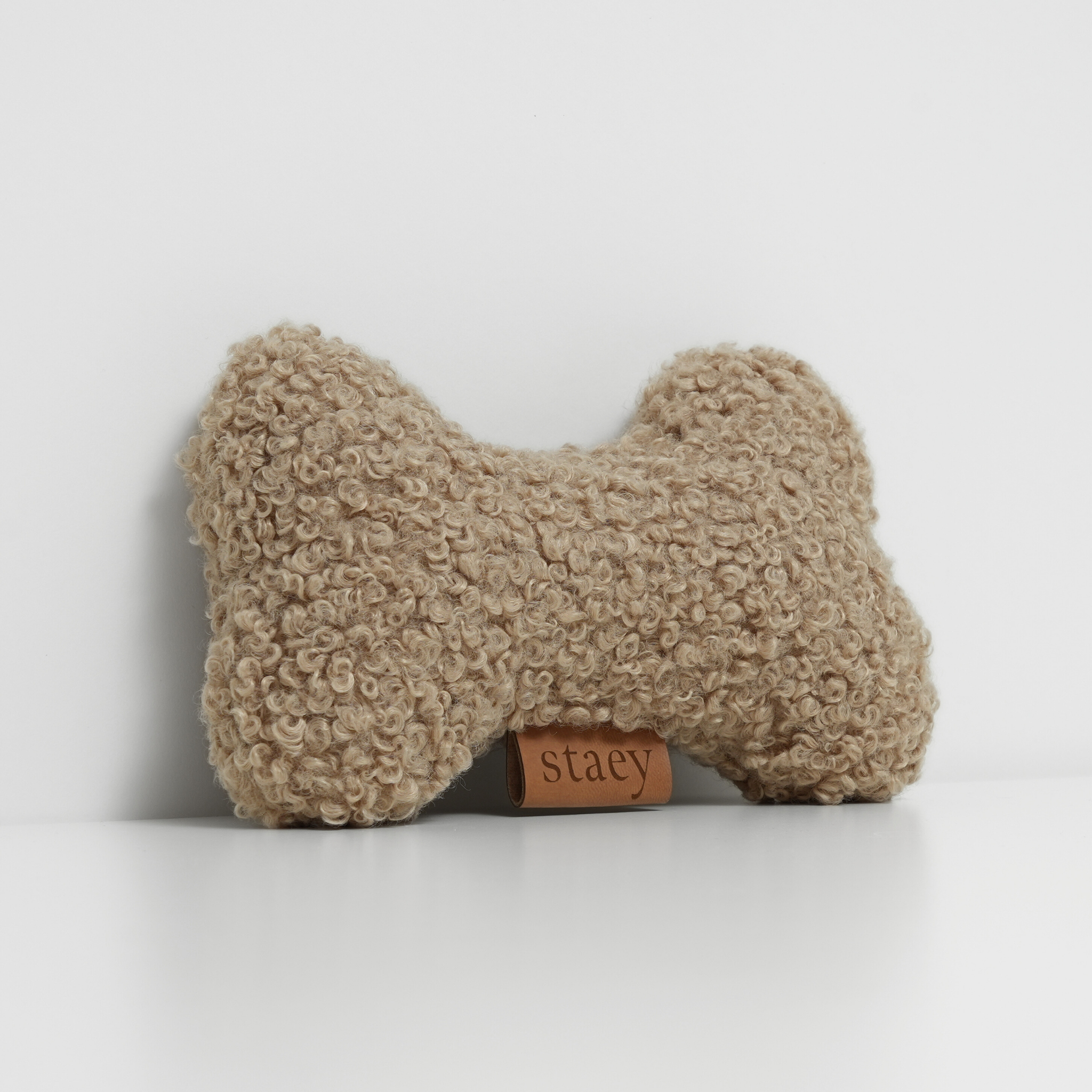 Juguete de hueso | arena rizada